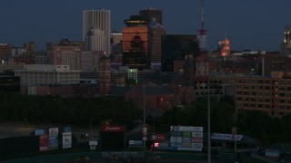 5.7K aerial stock footage of reverse view of Spiritus Christi Church at twilight, Downtown Rochester, New York Aerial Stock Footage | DX0002_210_014