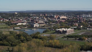 5.7K aerial stock footage of an apartment complex next to Onondaga Creek, Syracuse, New York Aerial Stock Footage | DX0002_211_035