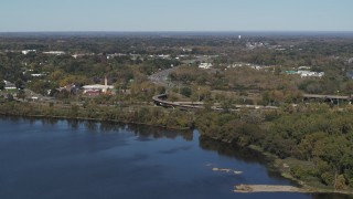 5.7K aerial stock footage the State Route 370 interchange by the lake in Syracuse, New York Aerial Stock Footage | DX0002_211_038