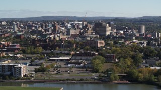 5.7K aerial stock footage of passing the city's downtown area, Downtown Syracuse, New York Aerial Stock Footage | DX0002_212_007