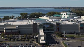 DX0002_212_010 - 5.7K aerial stock footage of circling the Destiny USA shopping mall in Syracuse, New York