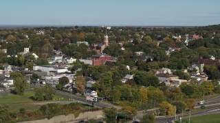 5.7K aerial stock footage of approaching the St John the Baptist church steeple in Syracuse, New York Aerial Stock Footage | DX0002_212_014