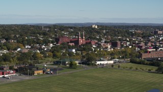 DX0002_212_016 - 5.7K aerial stock footage of flying by Assumption Church in Syracuse, New York