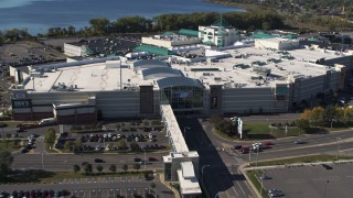 5.7K aerial stock footage a reverse view of the Destiny USA shopping mall, Syracuse, New York Aerial Stock Footage | DX0002_212_024