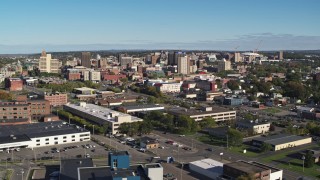 5.7K aerial stock footage of the city's downtown area while ascending by office buildings, Downtown Syracuse, New York Aerial Stock Footage | DX0002_212_029