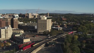 5.7K aerial stock footage reverse view and orbit of the 500 Building office high-rise, Downtown Syracuse, New York Aerial Stock Footage | DX0002_213_047