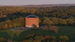 5.7K aerial stock footage of the Stewart Stand Pipe at Thornden Park, Syracuse at sunset, New York Aerial Stock Footage | DX0002_214_029