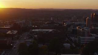 5.7K aerial stock footage of circling Crouse Hospital in Downtown Syracuse at sunset, New York Aerial Stock Footage | DX0002_214_035