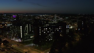 5.7K aerial stock footage of descend by university dormitories at twilight, Syracuse, New York Aerial Stock Footage | DX0002_215_008