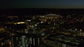 5.7K aerial stock footage of circling Carrier Dome and Syracuse University at twilight, Syracuse, New York Aerial Stock Footage | DX0002_215_020