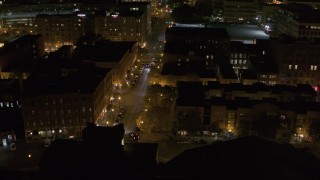 5.7K aerial stock footage of orbiting Franklin Street at night, Downtown Syracuse, New York Aerial Stock Footage | DX0002_215_023