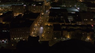 5.7K aerial stock footage of slowly orbiting Franklin Street at night, Downtown Syracuse, New York Aerial Stock Footage | DX0002_215_024