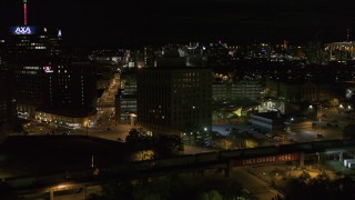 5.7K aerial stock footage orbit a dark office building at night, Downtown Syracuse, New York Aerial Stock Footage | DX0002_215_031