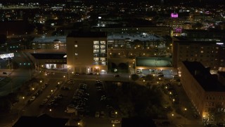 5.7K aerial stock footage of flying toward an office building at night, Downtown Syracuse, New York Aerial Stock Footage | DX0002_215_047