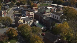 DX0002_216_028 - 5.7K aerial stock footage fly away from buildings on Broadway and descend, Fort Edward, New York