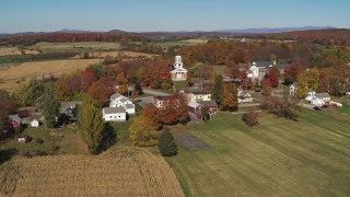 DX0002_217_015 - 5.7K aerial stock footage of a church in the small town of Orwell, Vermont