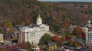 5.7K aerial stock footage of approaching the state capitol behind a government office building, Montpelier, Vermont Aerial Stock Footage | DX0002_218_036