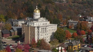 5.7K aerial stock footage descend by a government office building, capitol dome behind it, Montpelier, Vermont Aerial Stock Footage | DX0002_218_039