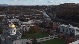 5.7K aerial stock footage of government and brick office buildings near the river in Montpelier, Vermont Aerial Stock Footage | DX0002_219_012