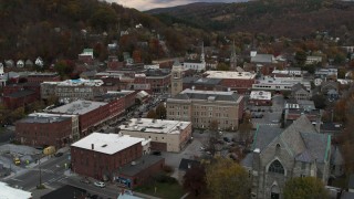 5.7K aerial stock footage of a stationary view of city hall and brick buildings at sunset, Montpelier, Vermont Aerial Stock Footage | DX0002_220_013