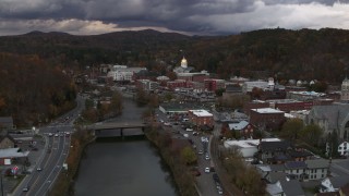 5.7K aerial stock footage of the state capitol at sunset while following the river, Montpelier, Vermont Aerial Stock Footage | DX0002_220_022