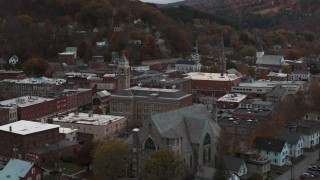 5.7K aerial stock footage of passing by a church and city hall at sunset, Montpelier, Vermont Aerial Stock Footage | DX0002_220_033