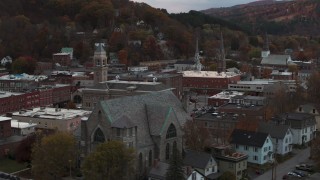 5.7K aerial stock footage of descend and flyby church and city hall at sunset, Montpelier, Vermont Aerial Stock Footage | DX0002_220_034