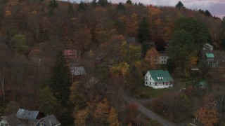 5.7K aerial stock footage of circling homes on a hill at sunset, Montpelier, Vermont Aerial Stock Footage | DX0002_220_040