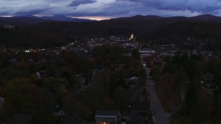 5.7K aerial stock footage of the downtown area of the city seen while flying by State Street at twilight, Montpelier, Vermont Aerial Stock Footage | DX0002_220_056