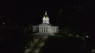 DX0002_221_004 - 5.7K aerial stock footage of a reverse view of the Vermont State Capitol at night, Montpelier, Vermont