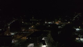 5.7K aerial stock footage of flying away from city buildings in downtown at night, Montpelier, Vermont Aerial Stock Footage | DX0002_221_015