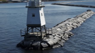 5.7K aerial stock footage closely orbiting a lighthouse on Lake Champlain, Burlington, Vermont Aerial Stock Footage | DX0002_222_027