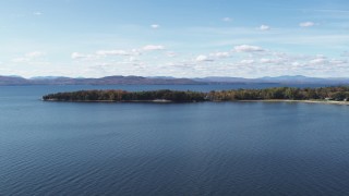 5.7K aerial stock footage of flying by a few waterfront homes on Appletree Point by Lake Champlain, Burlington, Vermont Aerial Stock Footage | DX0002_223_012