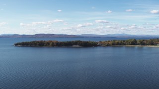 DX0002_223_013 - 5.7K aerial stock footage of passing by waterfront homes on Appletree Point by Lake Champlain, Burlington, Vermont