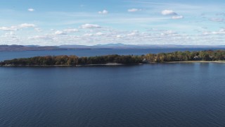 5.7K aerial stock footage of passing by lakefront homes on Appletree Point by Lake Champlain, Burlington, Vermont Aerial Stock Footage | DX0002_223_014