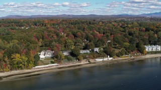 5.7K aerial stock footage of orbiting four beachfront homes on the shore of Lake Champlain, Burlington, Vermont Aerial Stock Footage | DX0002_223_027