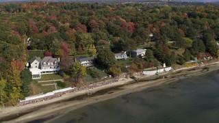 5.7K aerial stock footage of orbiting four beachfront homes by the shore of Lake Champlain, Burlington, Vermont Aerial Stock Footage | DX0002_223_030