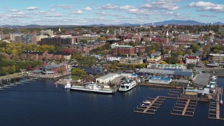 5.7K aerial stock footage of orbiting city buildings and Ferry Dock Marina in downtown, Burlington, Vermont Aerial Stock Footage | DX0002_224_002