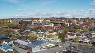 5.7K aerial stock footage of circling buildings in downtown, reveal the marina, Burlington, Vermont Aerial Stock Footage | DX0002_224_022