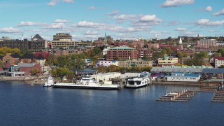 5.7K aerial stock footage orbit office building in downtown, seen from marina, Burlington, Vermont Aerial Stock Footage | DX0002_224_033