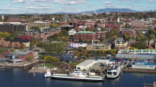 DX0002_224_038 - 5.7K aerial stock footage of orbiting an office building in downtown, Burlington, Vermont