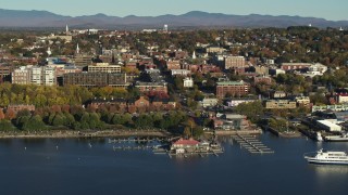 5.7K aerial stock footage of a wide orbit of city building near a marina in downtown, Burlington, Vermont Aerial Stock Footage | DX0002_224_049