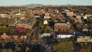 5.7K aerial stock footage ascend over a marina while focused on office buildings in downtown, Burlington, Vermont Aerial Stock Footage | DX0002_224_063