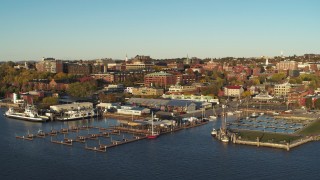 5.7K aerial stock footage an orbit of downtown buildings behind Lake Champlain marina, Burlington, Vermont Aerial Stock Footage | DX0002_224_073