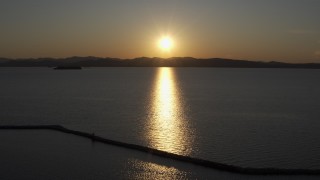 5.7K aerial stock footage setting sun reflecting off Lake Champlain, Burlington, Vermont Aerial Stock Footage | DX0002_225_001