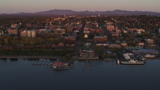 5.7K aerial stock footage circling downtown and two marinas at sunset, Burlington, Vermont Aerial Stock Footage | DX0002_225_021