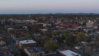 5.7K aerial stock footage flying over downtown office buildings at twilight, Burlington, Vermont Aerial Stock Footage | DX0002_225_026