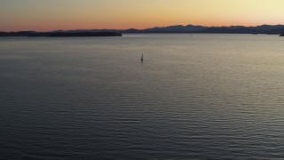 5.7K aerial stock footage approach sailboat on Lake Champlain at twilight, Burlington, Vermont Aerial Stock Footage | DX0002_225_033