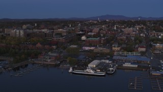 5.7K aerial stock footage circling around downtown area and the lakeside marinas at twilight, Burlington, Vermont Aerial Stock Footage | DX0002_225_044