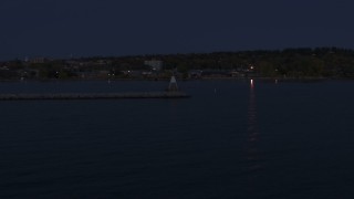 5.7K aerial stock footage of orbiting around a Lake Champlain lighthouse at night, Burlington, Vermont Aerial Stock Footage | DX0002_226_007